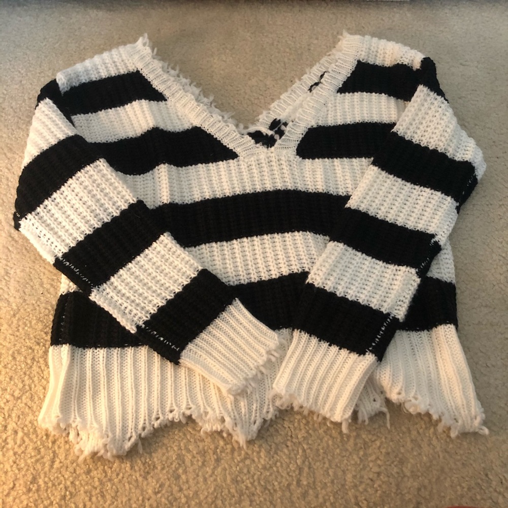 Black and white striped distressed sweater